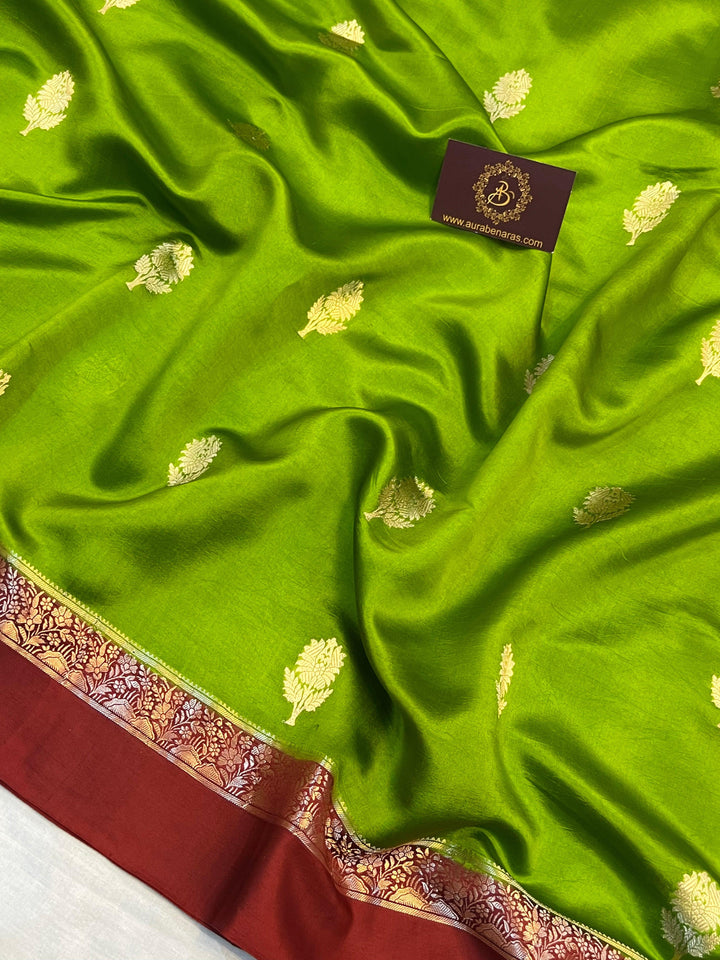 Intricate golden zari Kadhwa butas on pure silk Banarasi saree