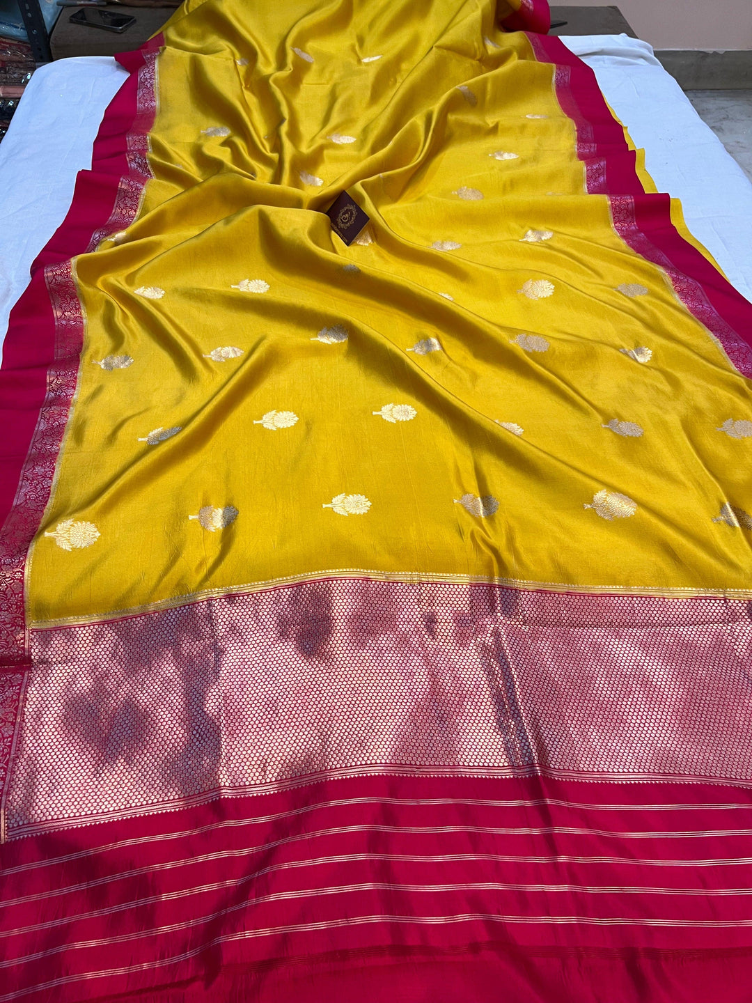 Pure silk handloom Banarasi saree with golden zari Kadhwa butas and contrast Mashru silk borders