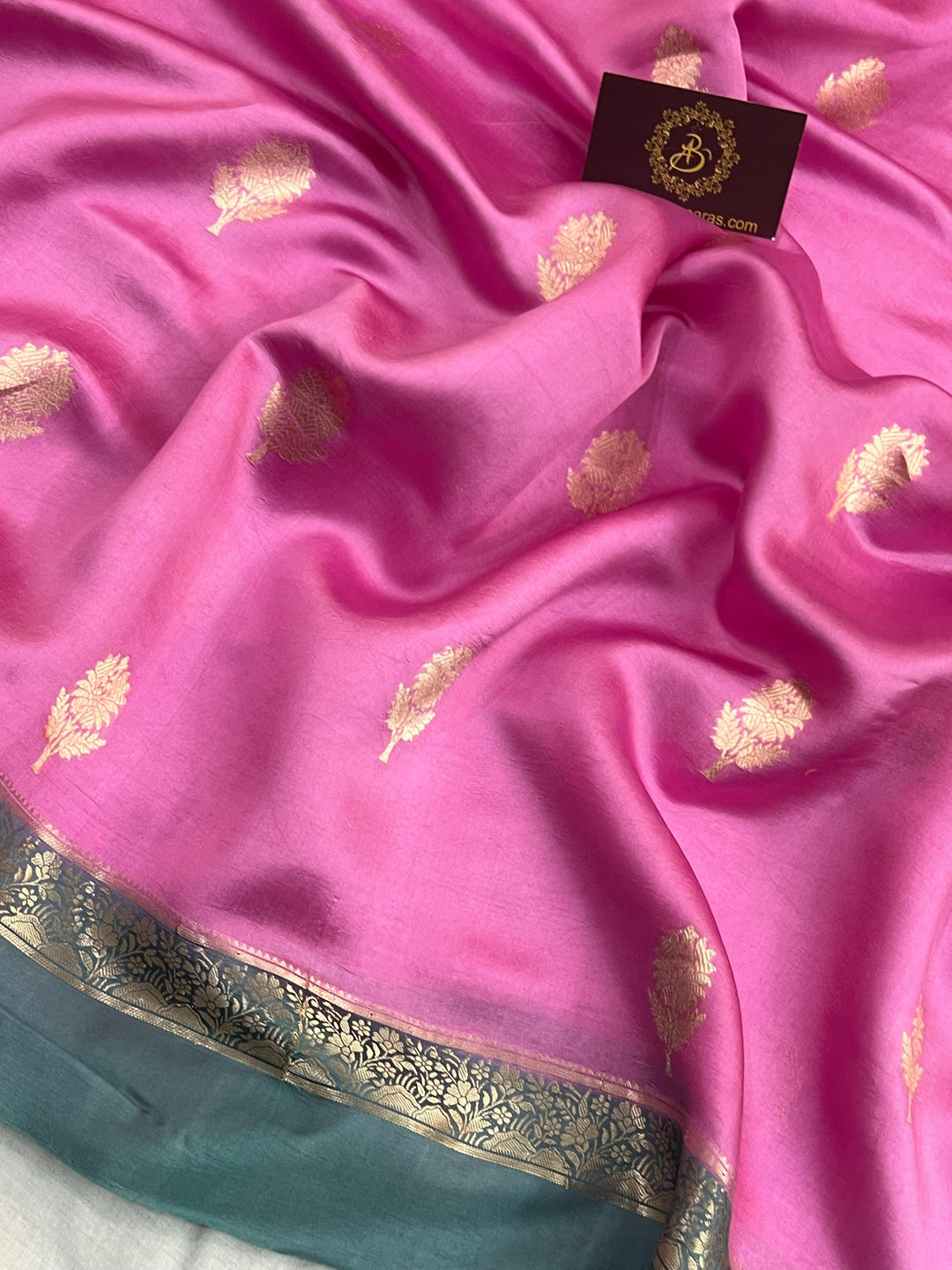 Intricate golden zari Kadhwa butas on pure silk Banarasi saree