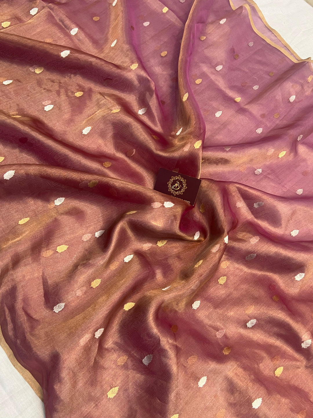 Plain blouse piece with matching border included with pure tissue silk Banarasi saree