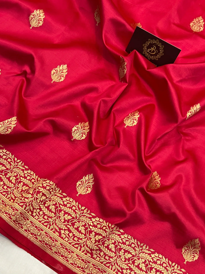 Red Banarasi silk saree with gold zari floral motifs and ornate border