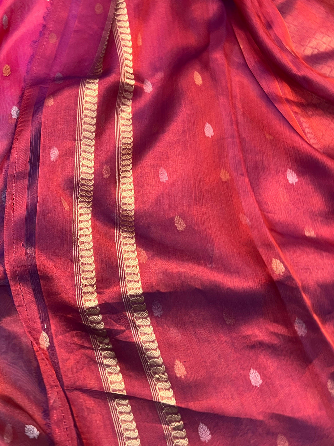 Plain blouse piece with matching border included with pure tissue silk Banarasi saree