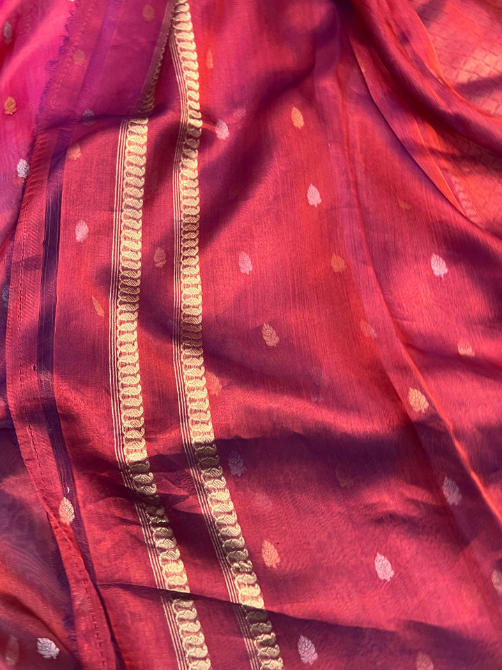 Plain blouse piece with matching border included with pure tissue silk Banarasi saree
