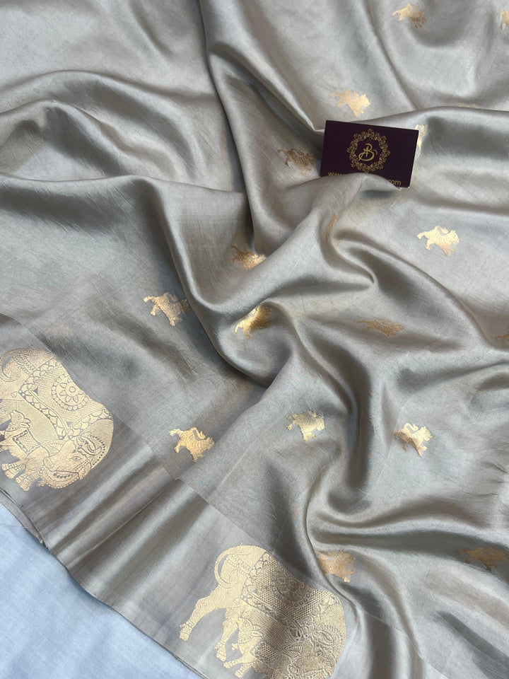 Detailed view of golden zari Kadhwa motifs on pure silk Banarasi saree