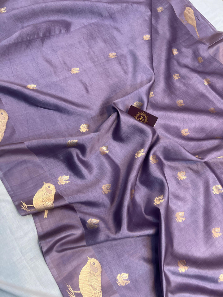 Close-up of Mashru silk border with intricate Kadhwa animal motifs on Banarasi saree