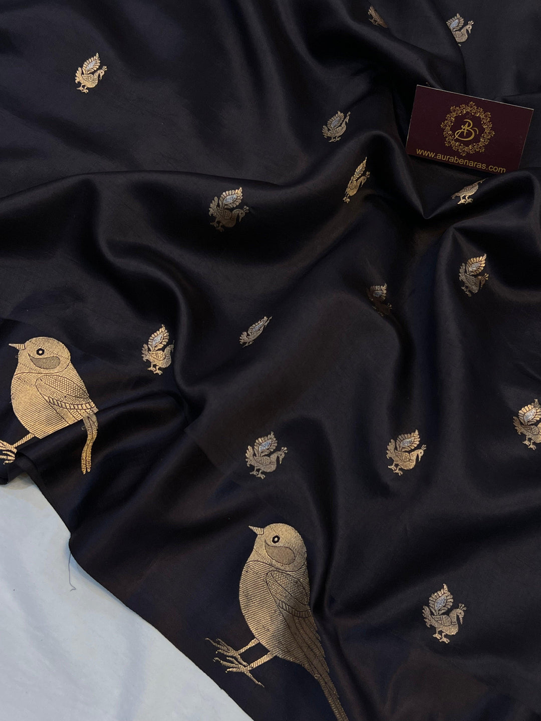 Detailed view of golden zari Kadhwa motifs on pure silk Banarasi saree