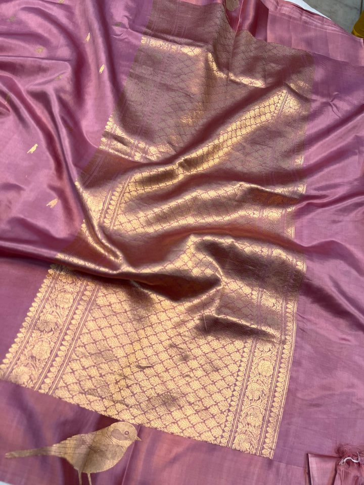 Close-up of Mashru silk border with intricate Kadhwa animal motifs on Banarasi saree