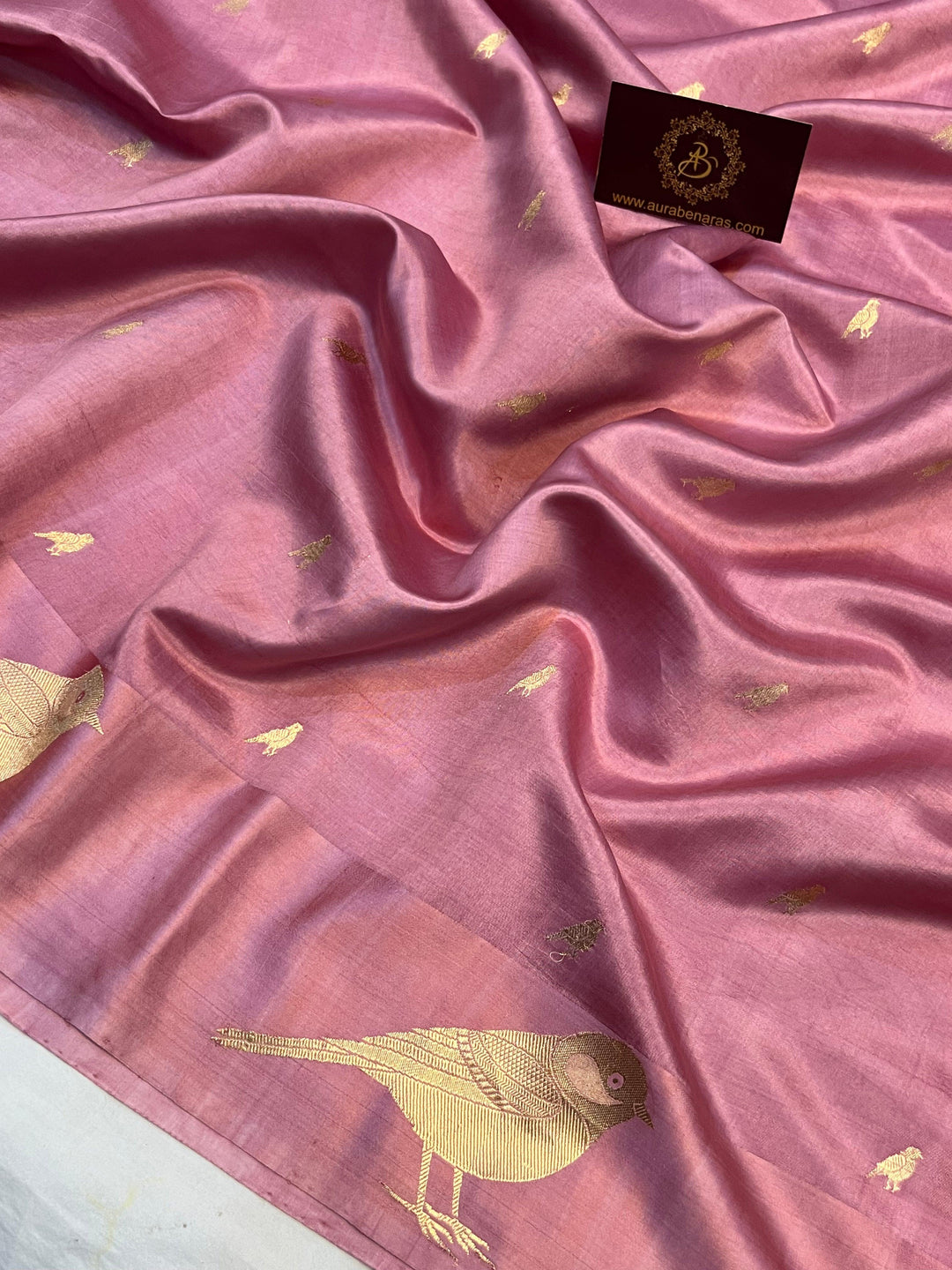 Detailed view of golden zari Kadhwa motifs on pure silk Banarasi saree