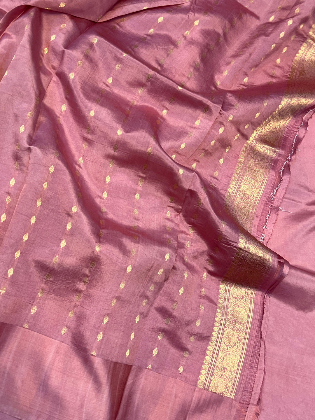Plain blouse piece with small butis included with pure silk Banarasi saree