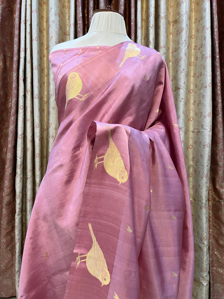 Pure silk handloom Banarasi saree with golden zari Kadhwa motifs and Mashru silk border featuring animal designs