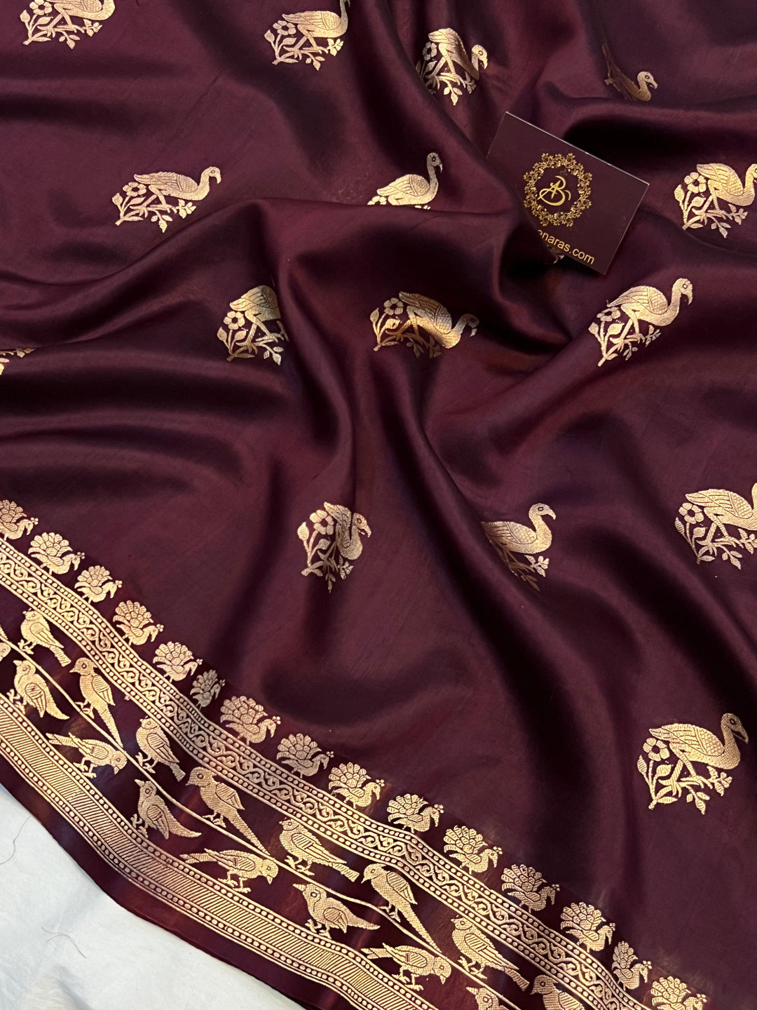 Detailed view of golden zari Kadhwa motifs on pure silk Banarasi saree