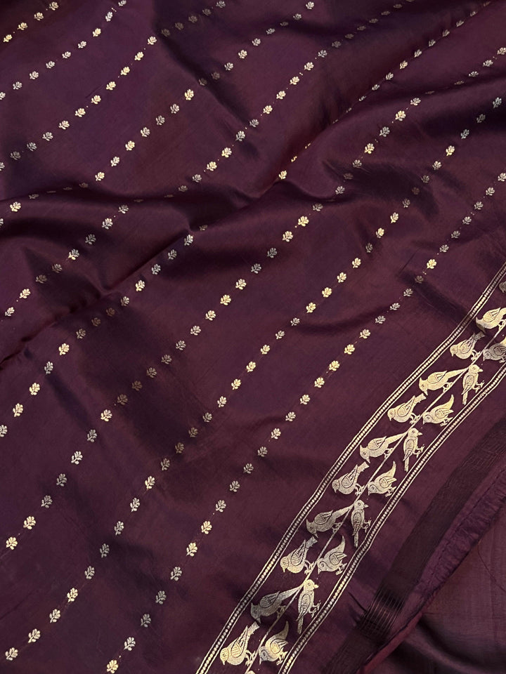 Plain blouse piece with small butis included with pure silk Banarasi saree