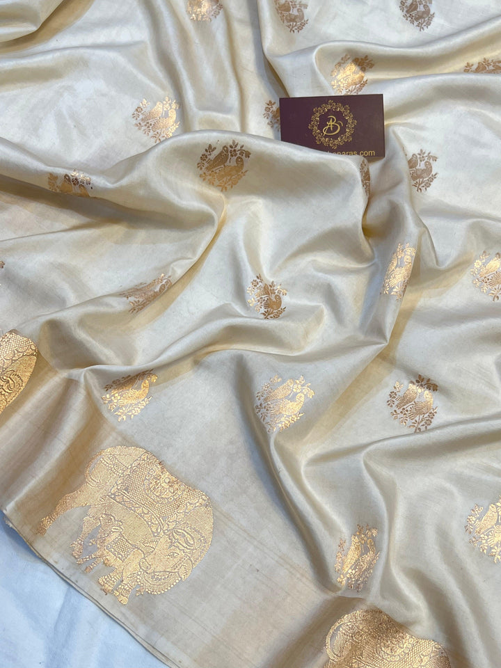 Detailed view of golden zari Kadhwa motifs on pure silk Banarasi saree
