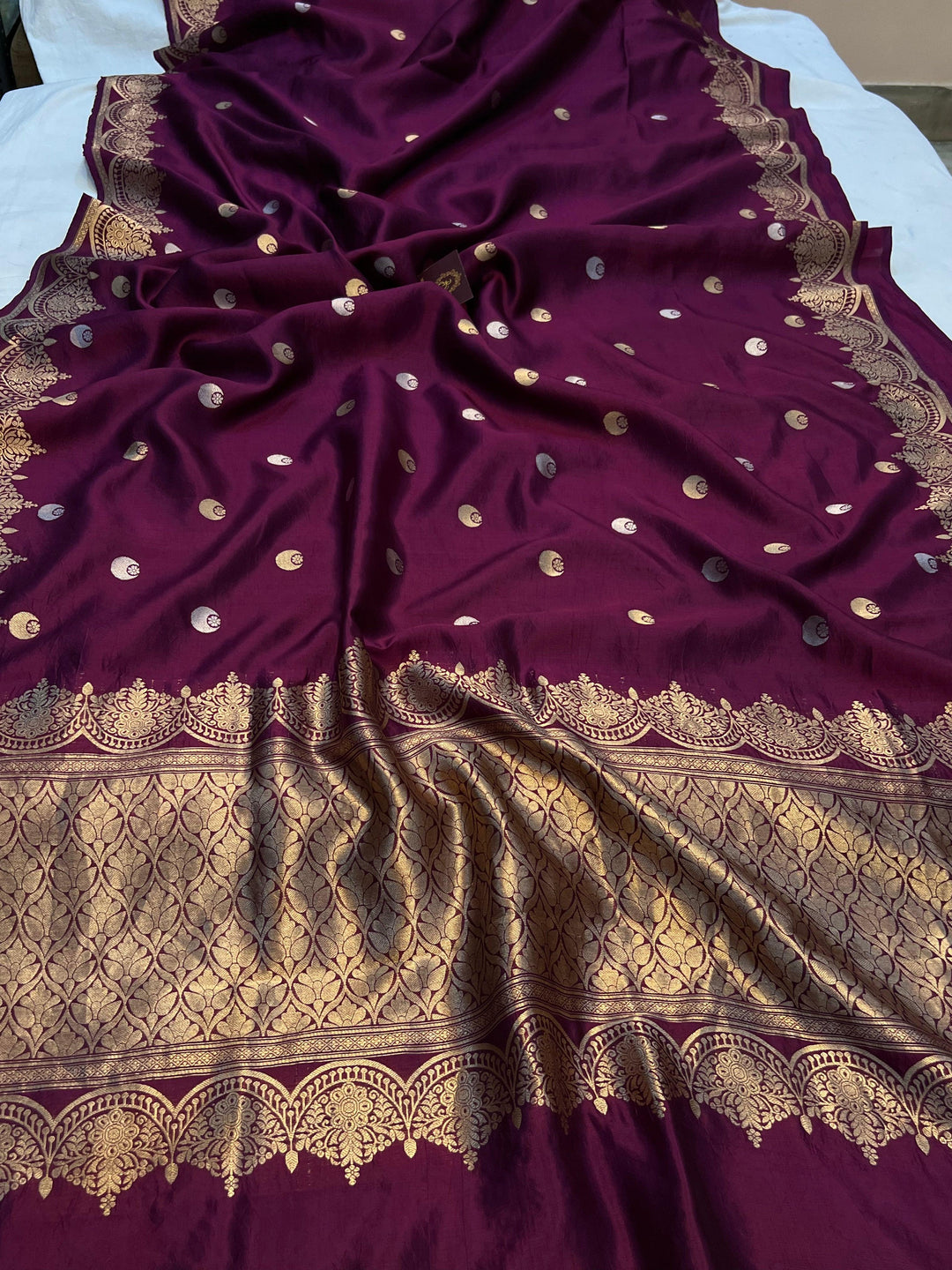 Pure Banarasi handloom silk saree with golden zari Kadhwa chand butis.