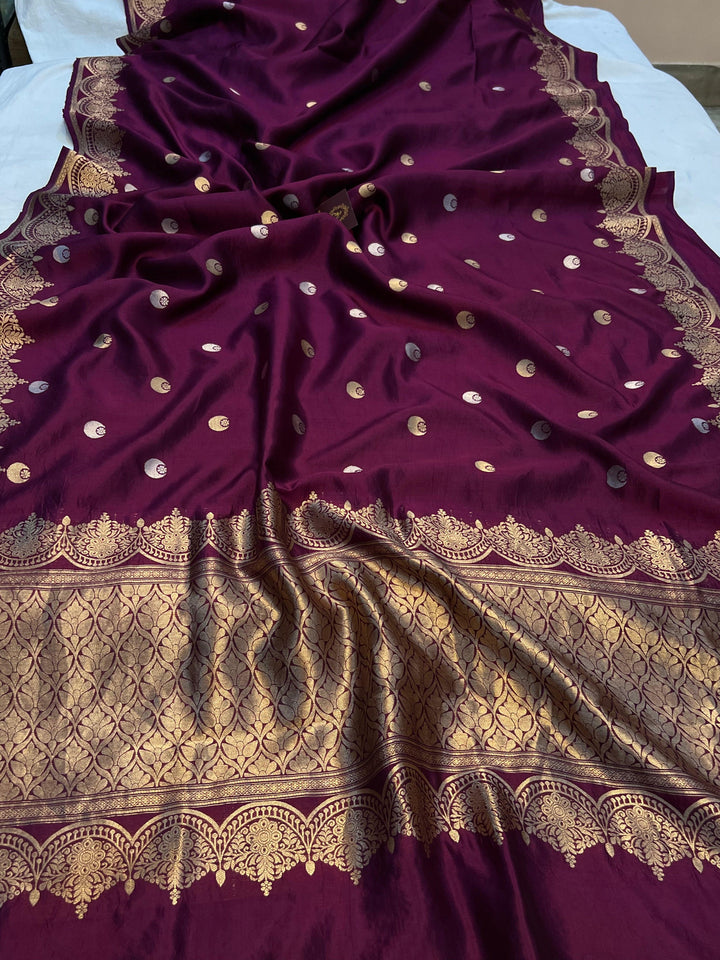 Pure Banarasi handloom silk saree with golden zari Kadhwa chand butis.