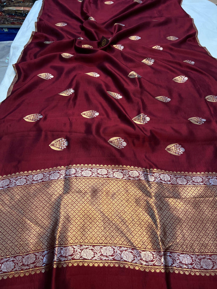 Pure silk handloom Banarasi saree with Kadhwa Sona Rupa motifs and borderless design.