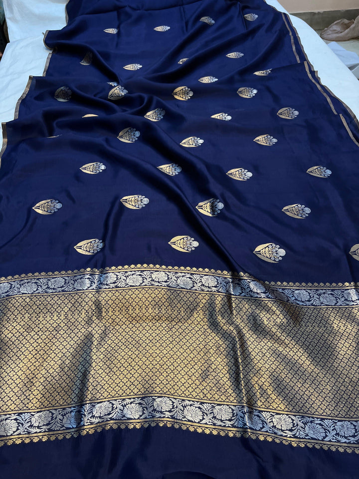 Pure silk handloom Banarasi saree with Kadhwa Sona Rupa motifs and borderless design.