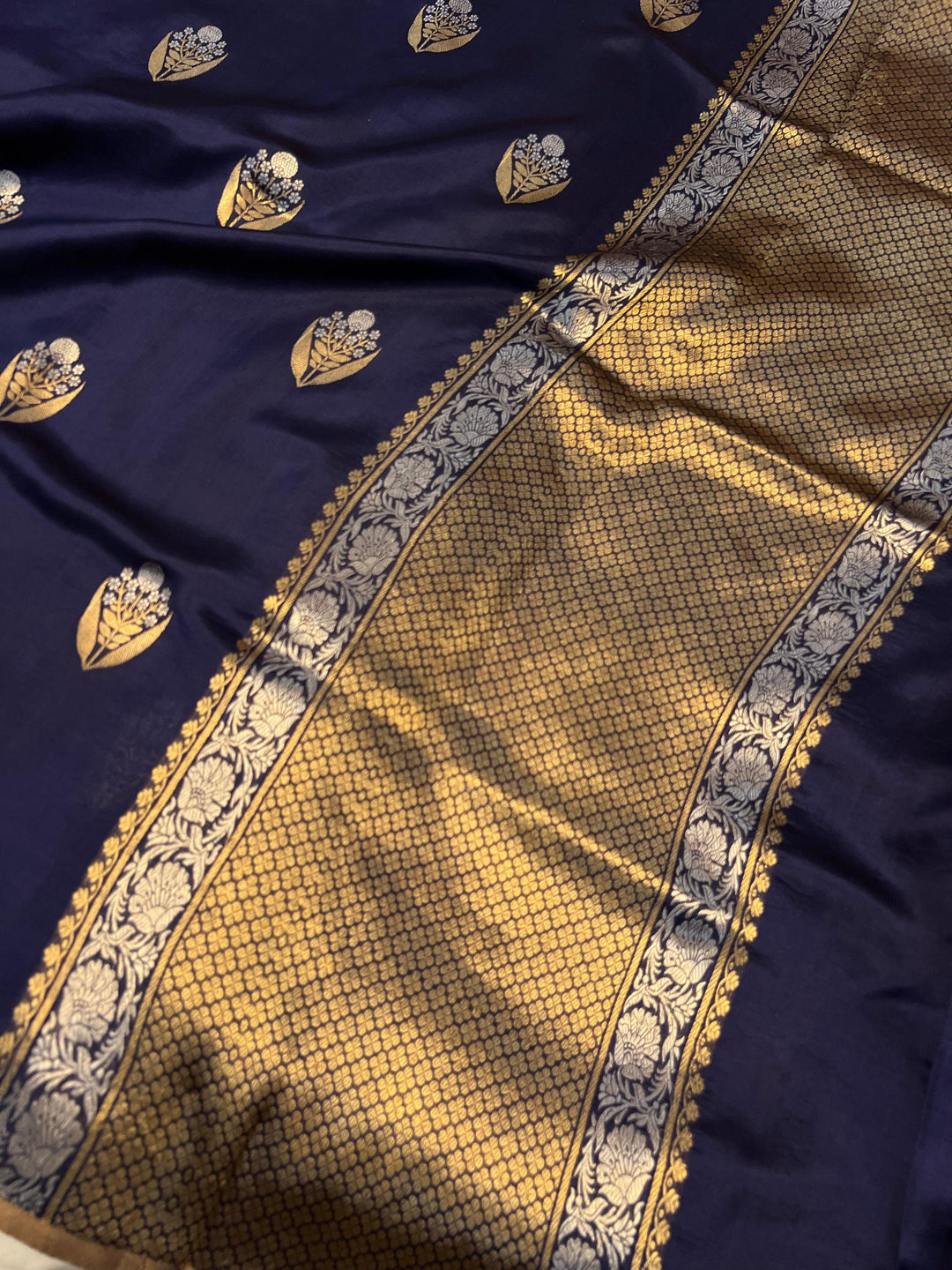 Pure silk handloom Banarasi saree with Kadhwa Sona Rupa motifs and borderless design.
