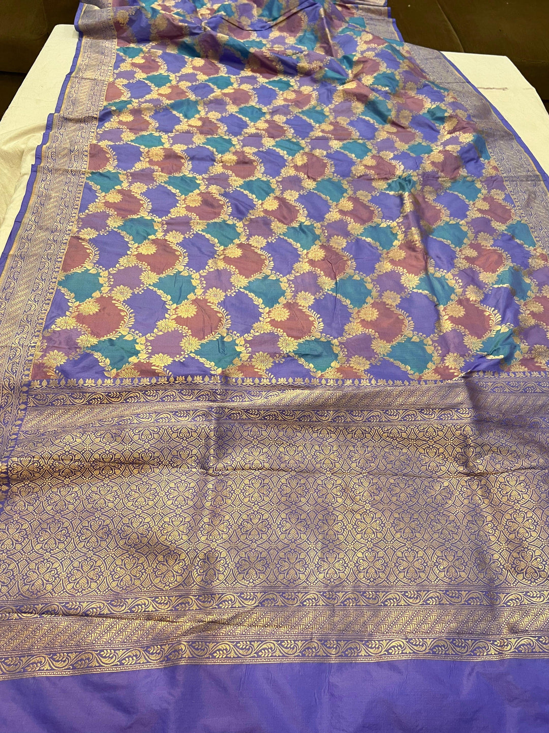 Pure Banarasi Rangkaat Katan silk saree with cutwork golden zari jaal in multicolor weave