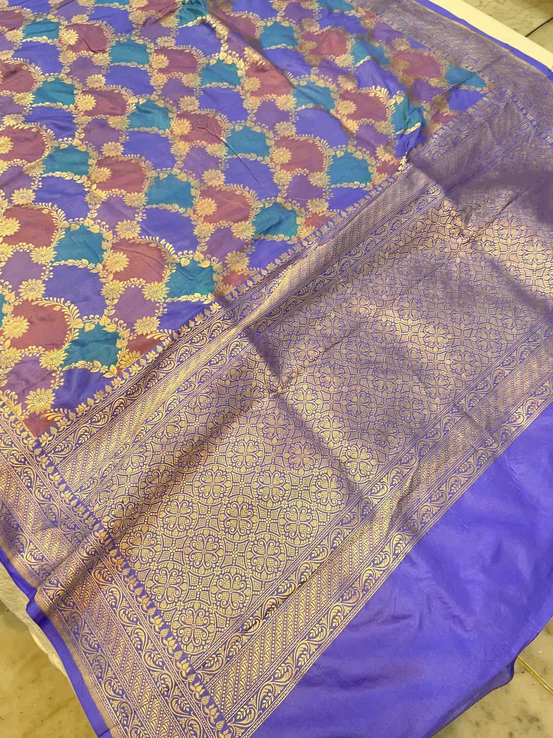 Elegant pallu and border of Banarasi Rangkaat saree with traditional zari detailing