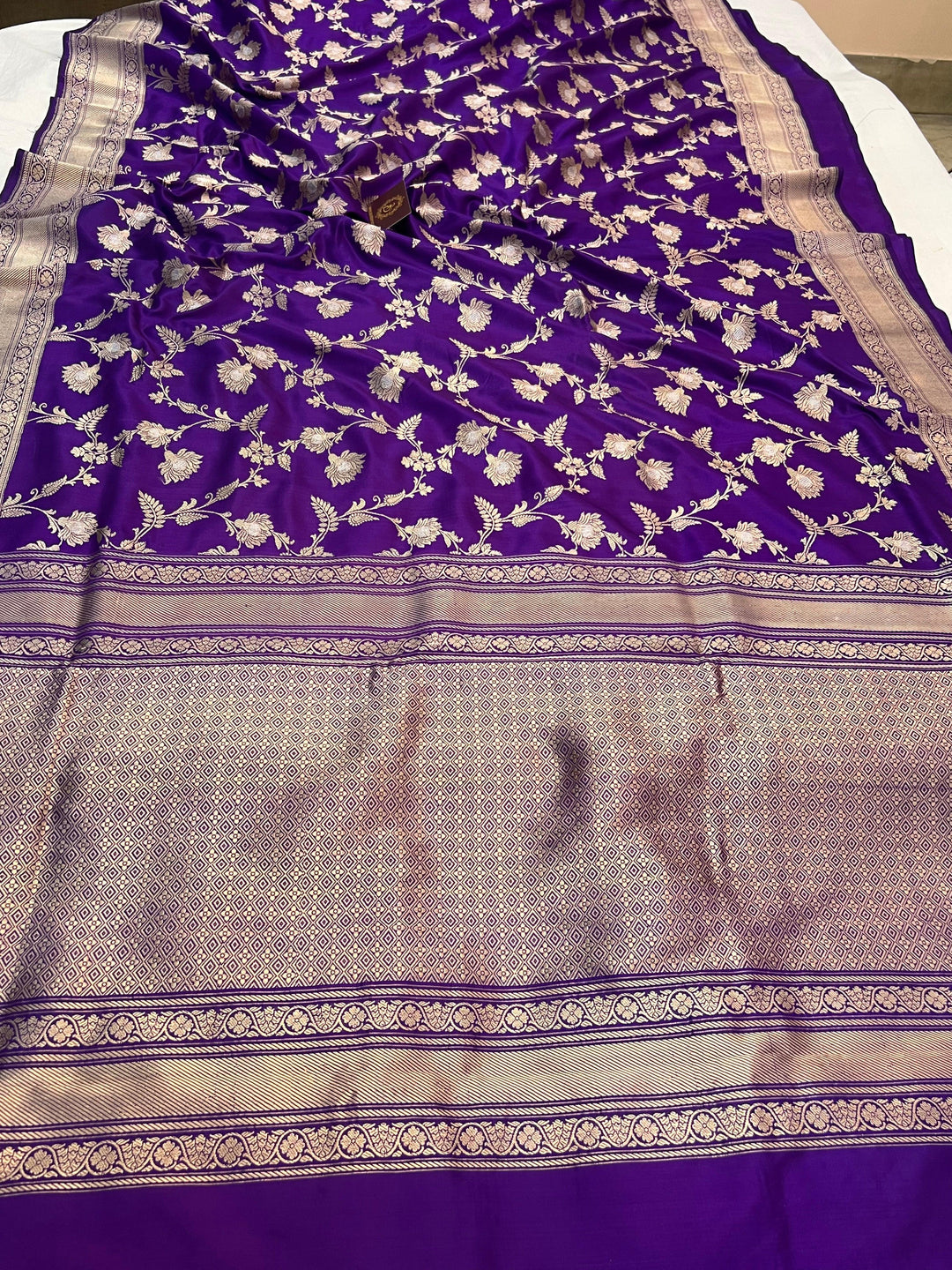 Pure Katan silk handloom Banarasi saree with Kadhwa jaal work and golden-silver zari floral design