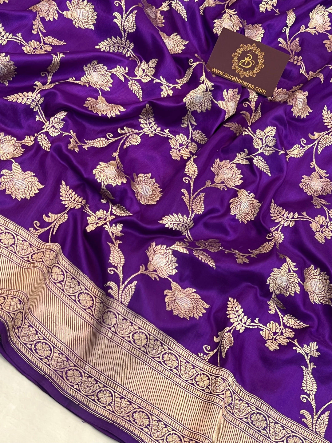 Exquisite Kadhwa jaal work with intricate golden and silver zari floral motifs on handwoven Katan silk Banarasi saree
