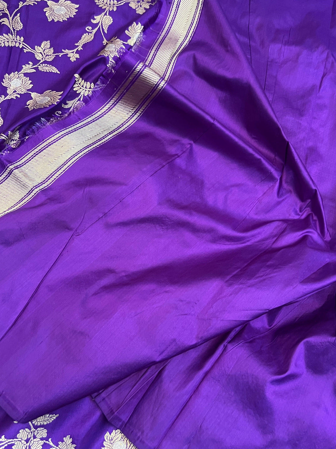 Plain unstitched blouse piece with border included with the pure Katan silk Banarasi saree