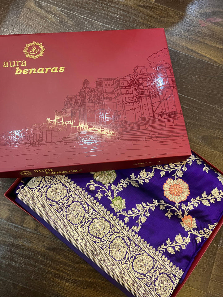 Folded view of pure Banarasi Katan silk saree showcasing detailed Kadhwa jaal work, Meenakari floral accents, and fine golden zari border