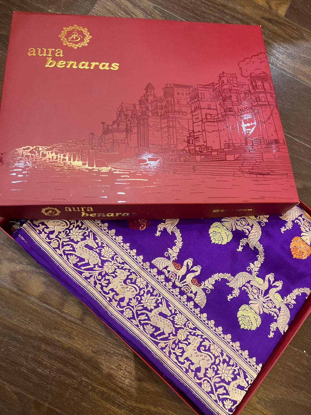 Folded view of pure Banarasi handloom Katan silk saree highlighting the exquisite Kadhwa Meenakari Shikargah jaal weaving