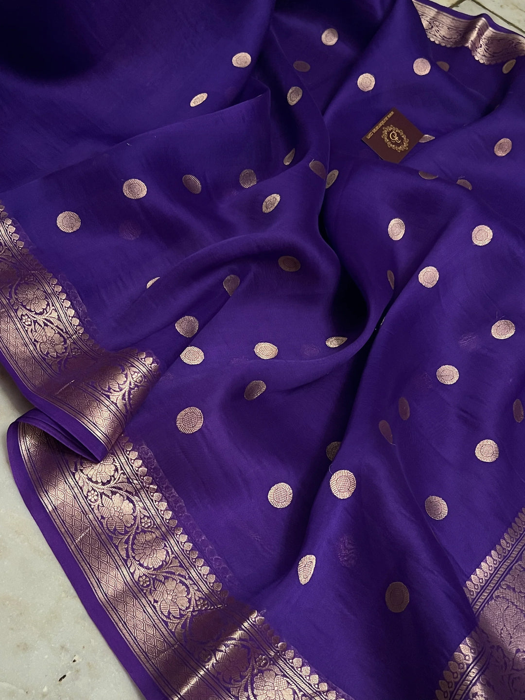 Purple Pure Banarasi handloom saree with intricate golden Kadhwa motifs 