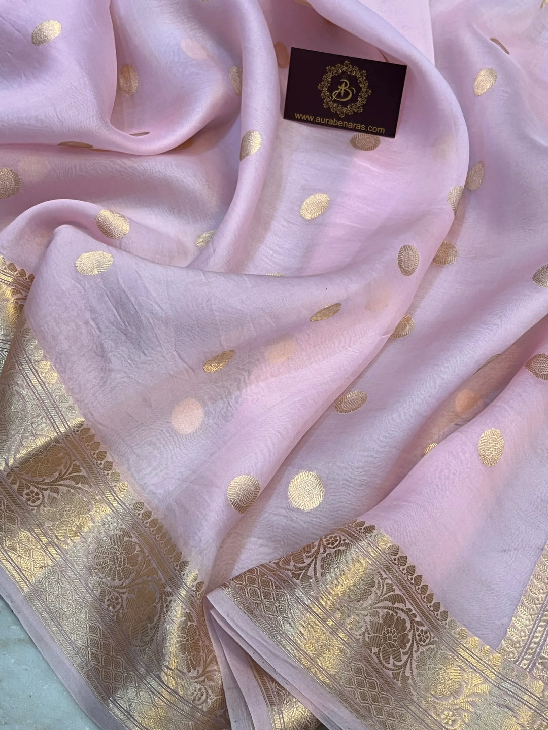 Pale Pink Pure Banarasi handloom saree with intricate golden Kadhwa motifs 