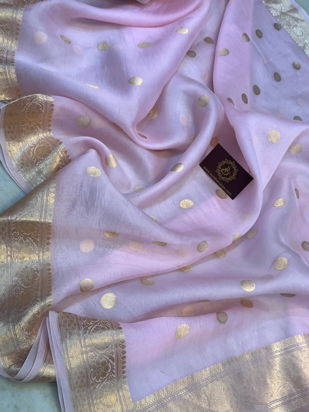 Pale Pink Pure Banarasi handloom saree with intricate golden Kadhwa motifs 