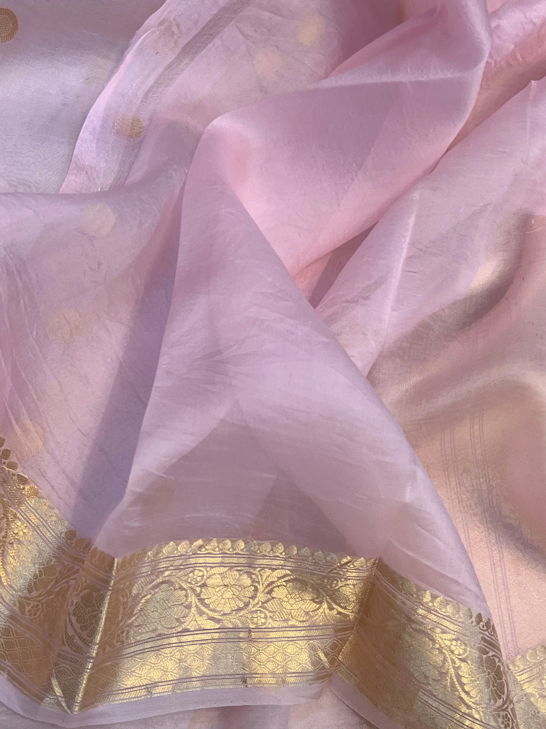 Pale Pink Pure Banarasi handloom saree with intricate golden Kadhwa motifs 