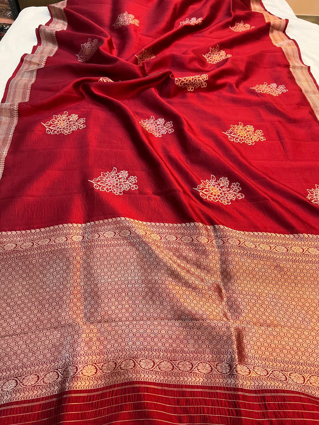 Pure silk handloom Banarasi saree with Kadhwa Meenakari butas and golden zari border