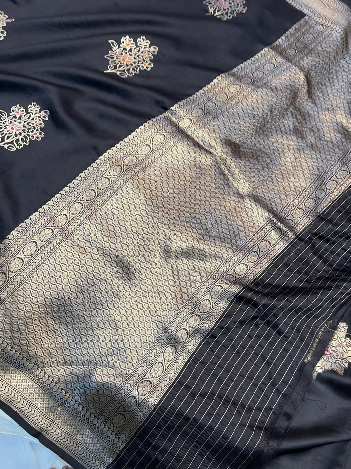 Rich pallu woven in golden zari on pure silk Banarasi saree with Meenakari butas