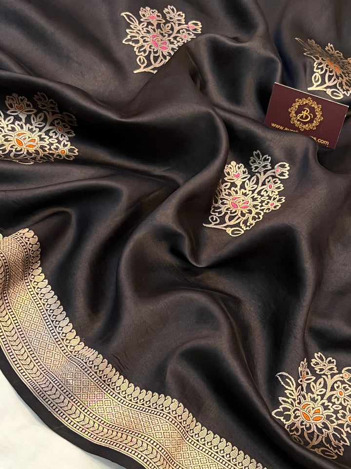 Intricate Kadhwa Meenakari butas in vibrant hues on pure silk Banarasi saree