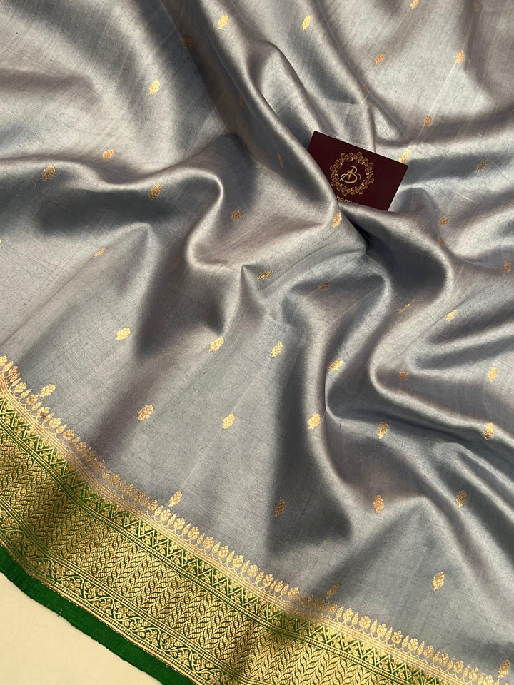 Detailed view of Kadhwa butis on lustrous pure silk Banarasi saree, handwoven in Varanasi