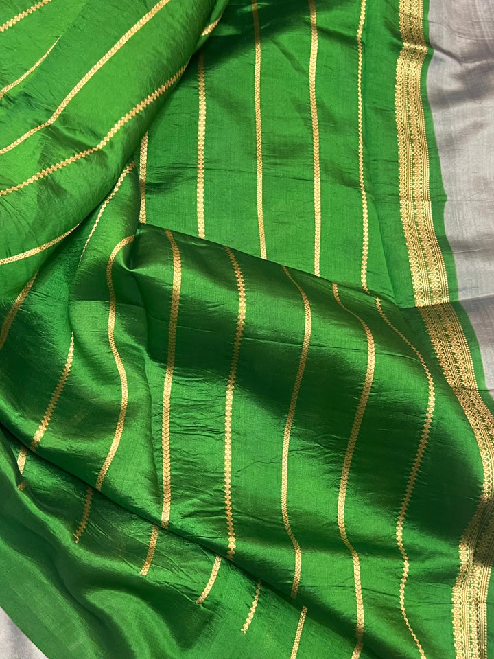 stripe unstitched blouse piece included with the pure silk handloom Banarasi saree