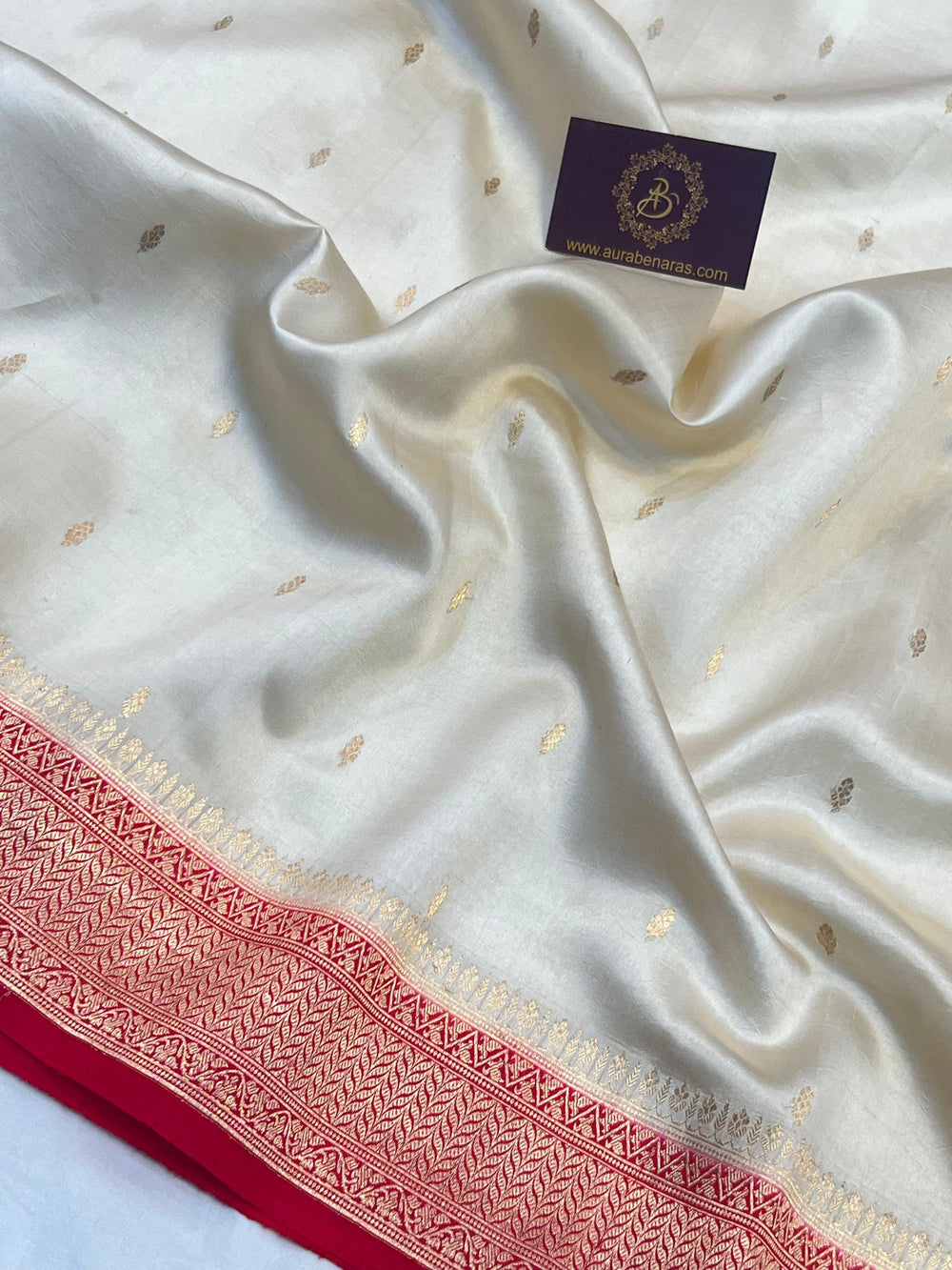 Detailed view of Kadhwa butis on lustrous pure silk Banarasi saree, handwoven in Varanasi