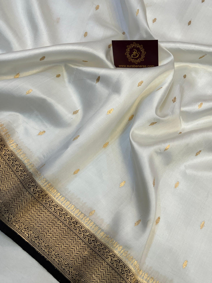Detailed view of Kadhwa butis on lustrous pure silk Banarasi saree, handwoven in Varanasi