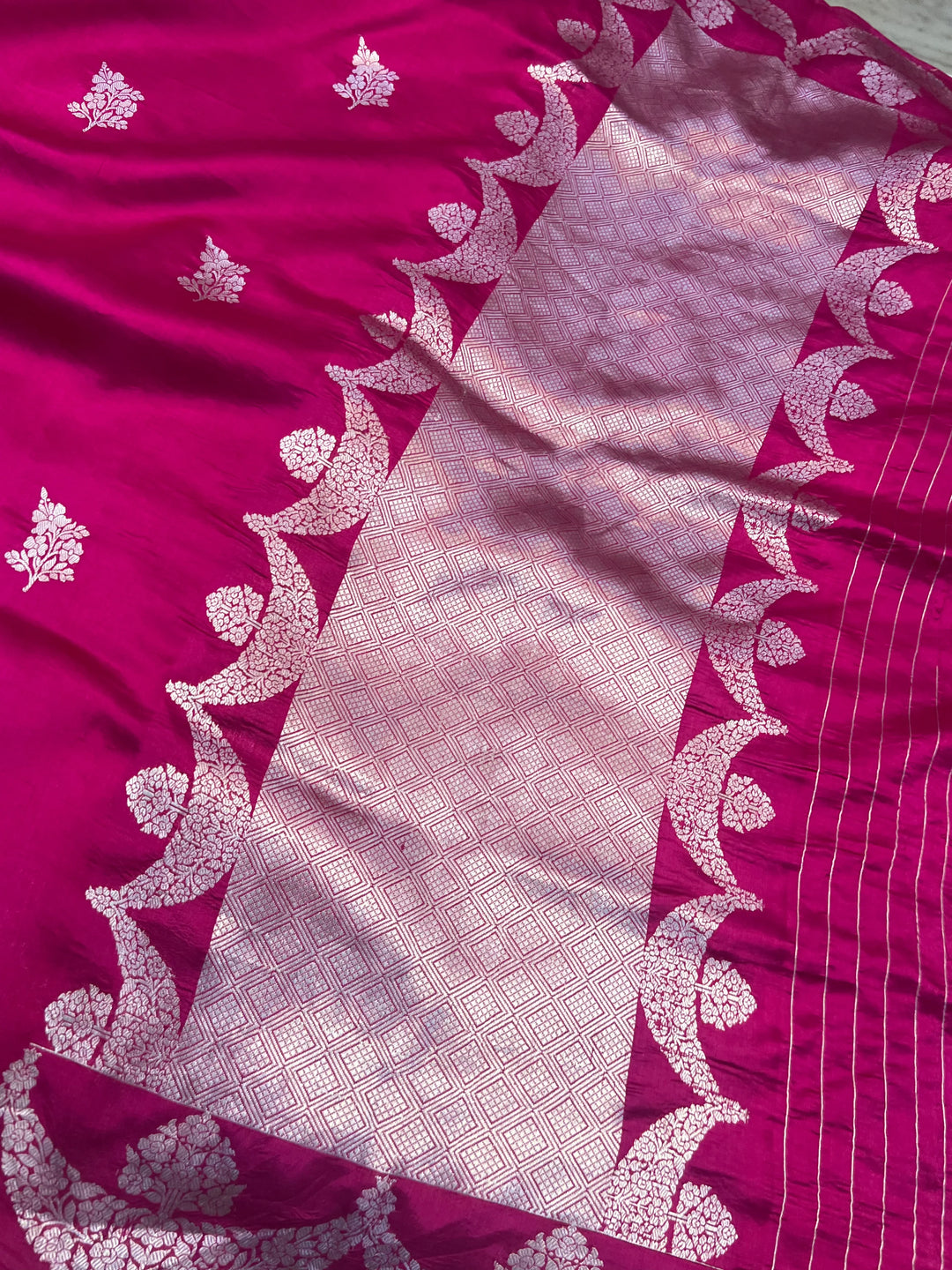 Rani Pink Pure silk handloom Banarasi saree with silver Kadhwa butas and scallop border
