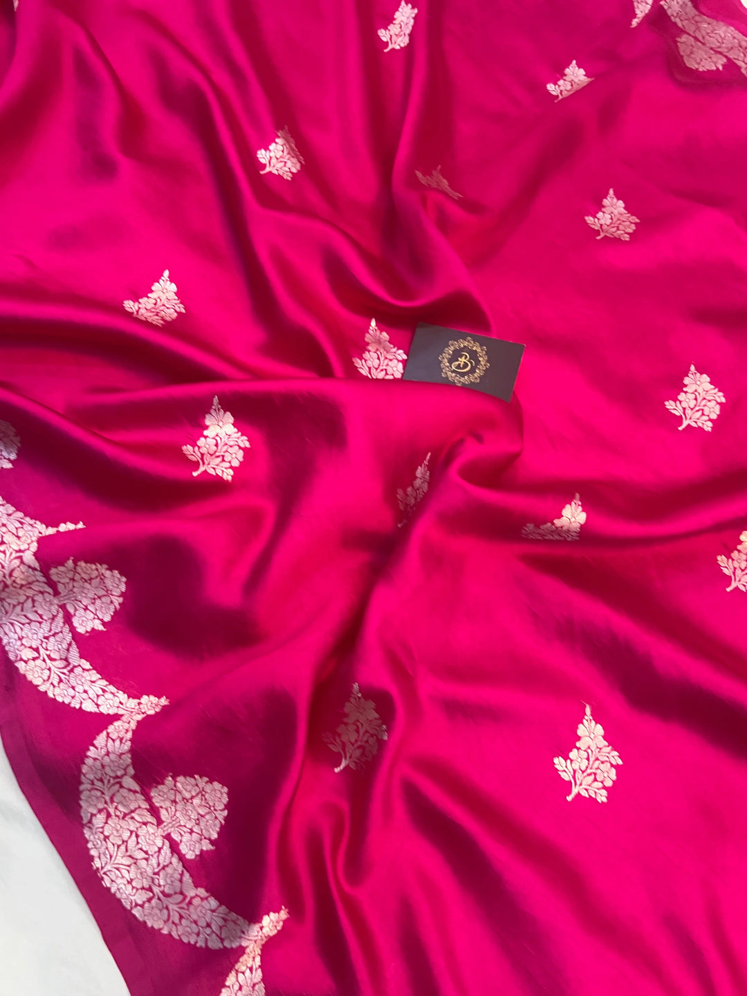 Rani Pink Pure silk handloom Banarasi saree with silver Kadhwa butas and scallop border