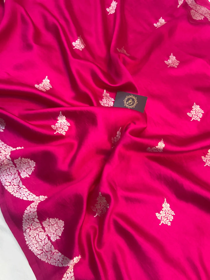 Rani Pink Pure silk handloom Banarasi saree with silver Kadhwa butas and scallop border