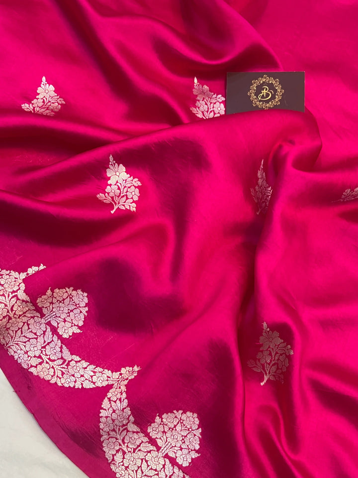 Rani Pink Pure silk handloom Banarasi saree with silver Kadhwa butas and scallop border