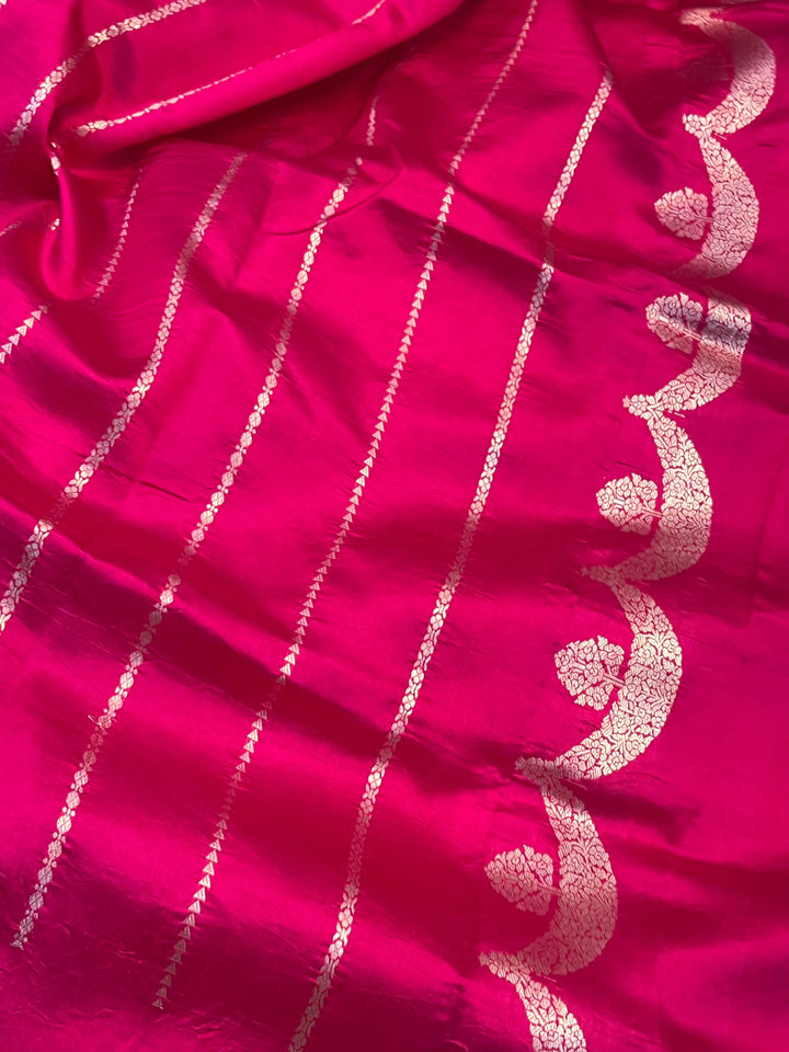Rani Pink Pure silk handloom Banarasi saree with silver Kadhwa butas and scallop border