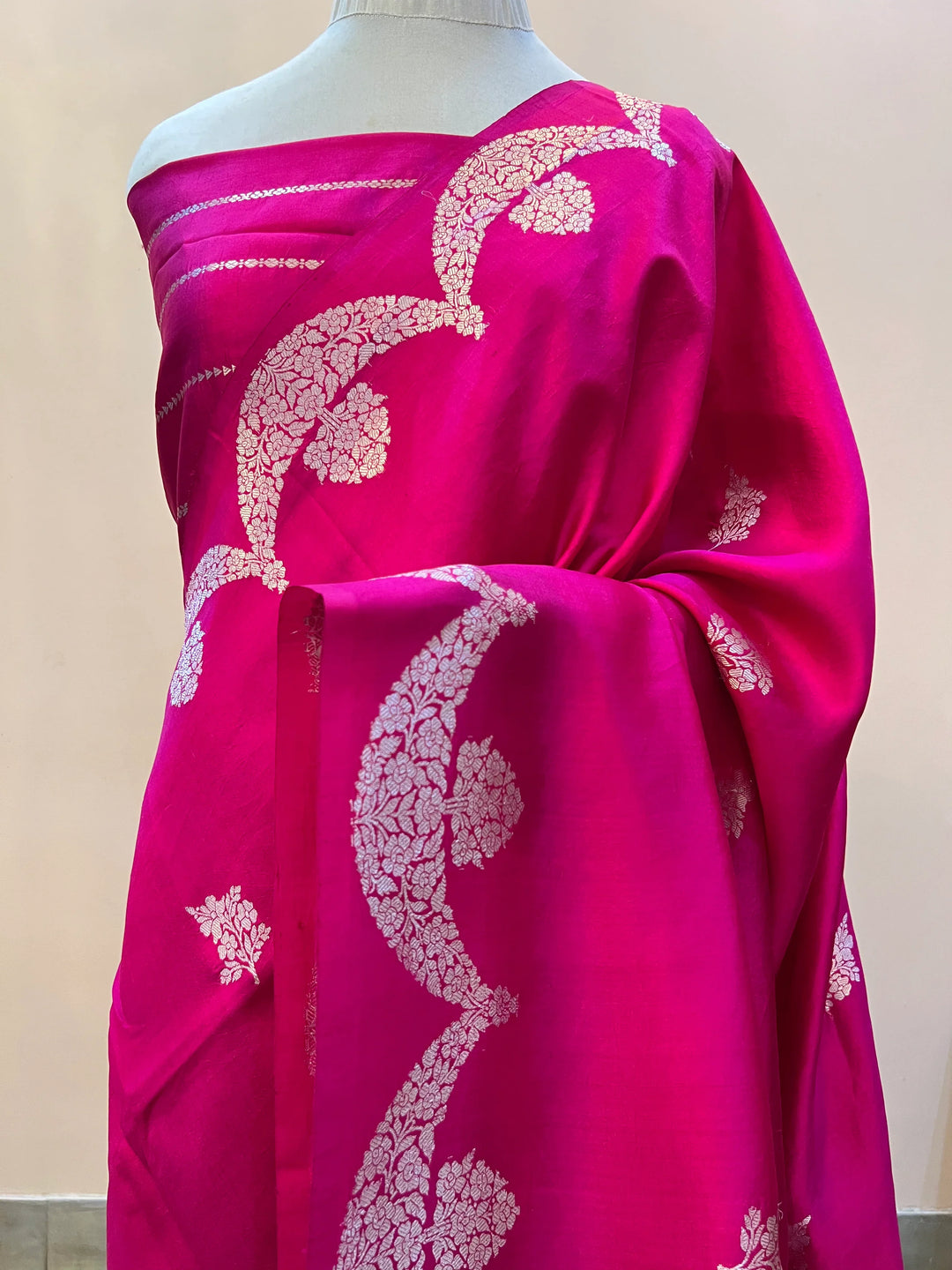 Rani Pink Pure silk handloom Banarasi saree with silver Kadhwa butas and scallop border