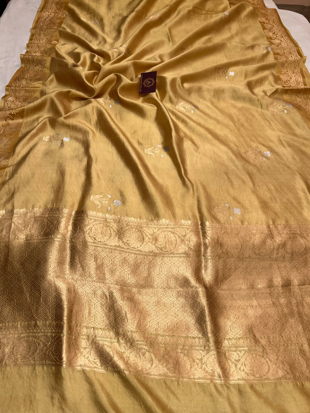 Golden Pure silk handloom Banarasi saree with golden Kadhwa floral motifs