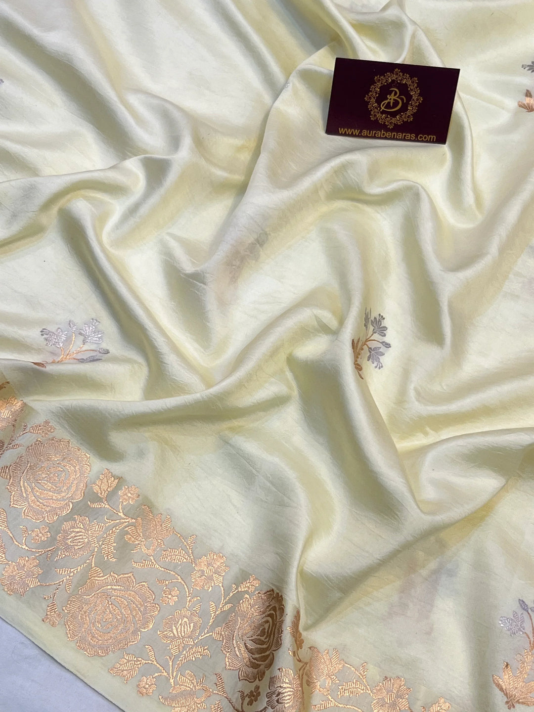 Cream Pure silk handloom Banarasi saree with golden Kadhwa floral motifs