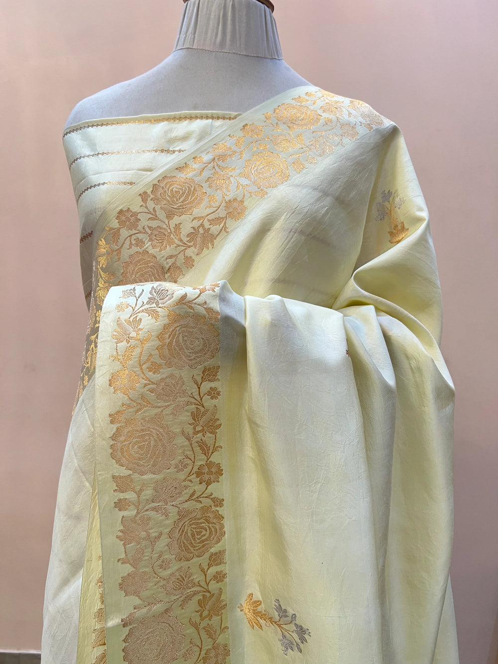 Cream Pure silk handloom Banarasi saree with golden Kadhwa floral motifs