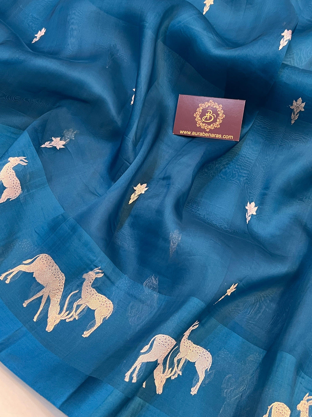 Kadhwa Sona Rupa butis in gold and silver zari, beautifully handwoven on pure Kora silk Banarasi saree